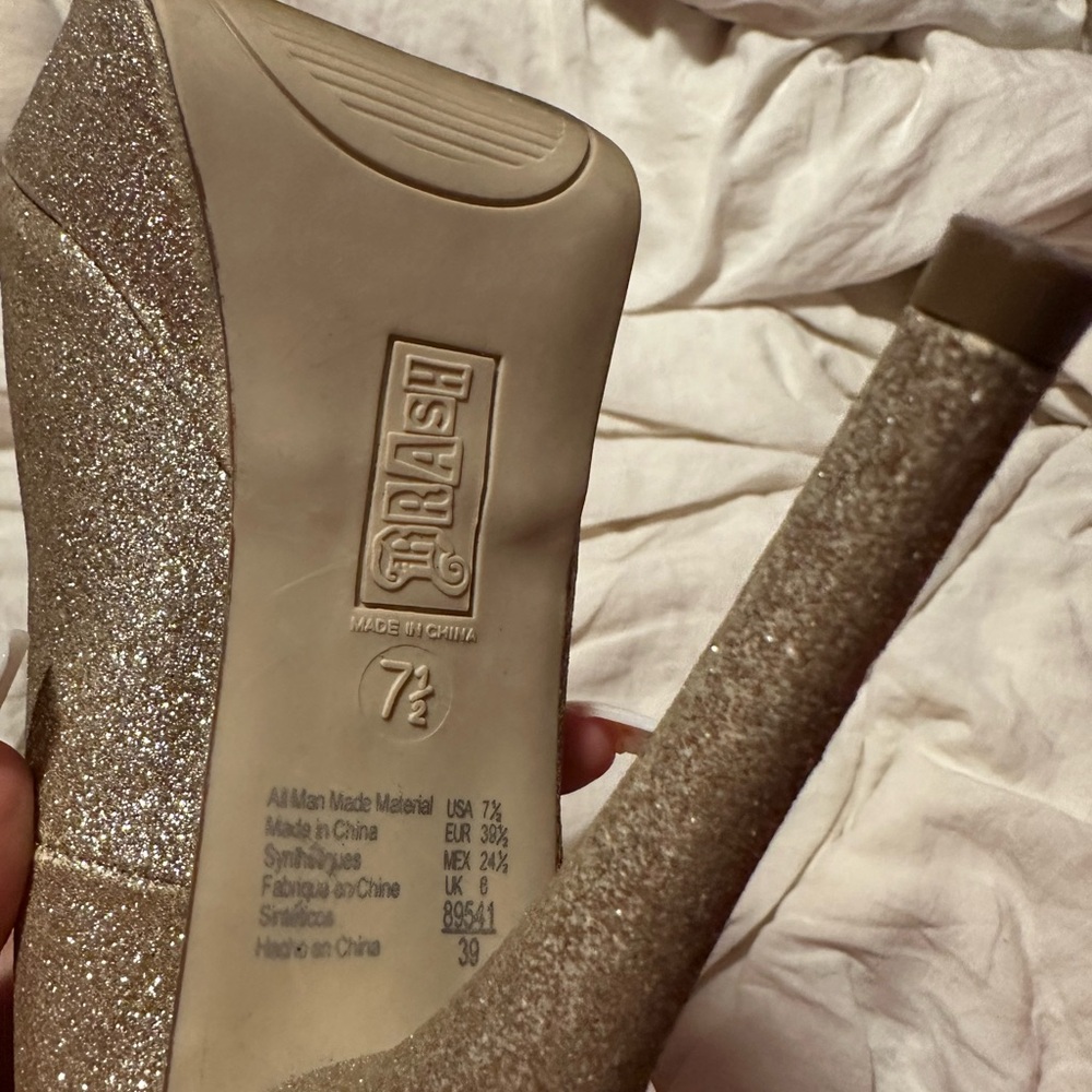 Gold high heels